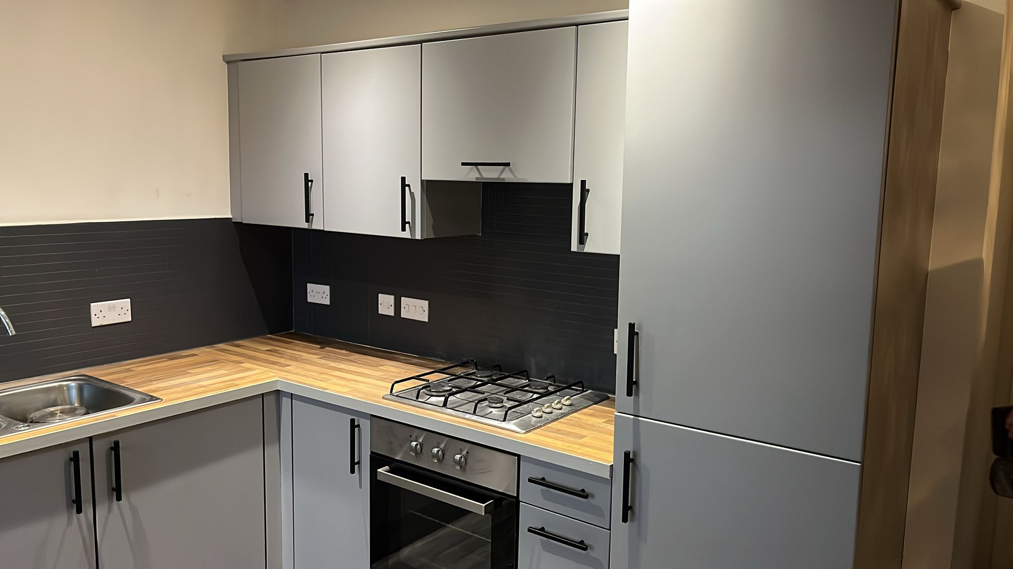 Grey kitchen cabinets sprayed