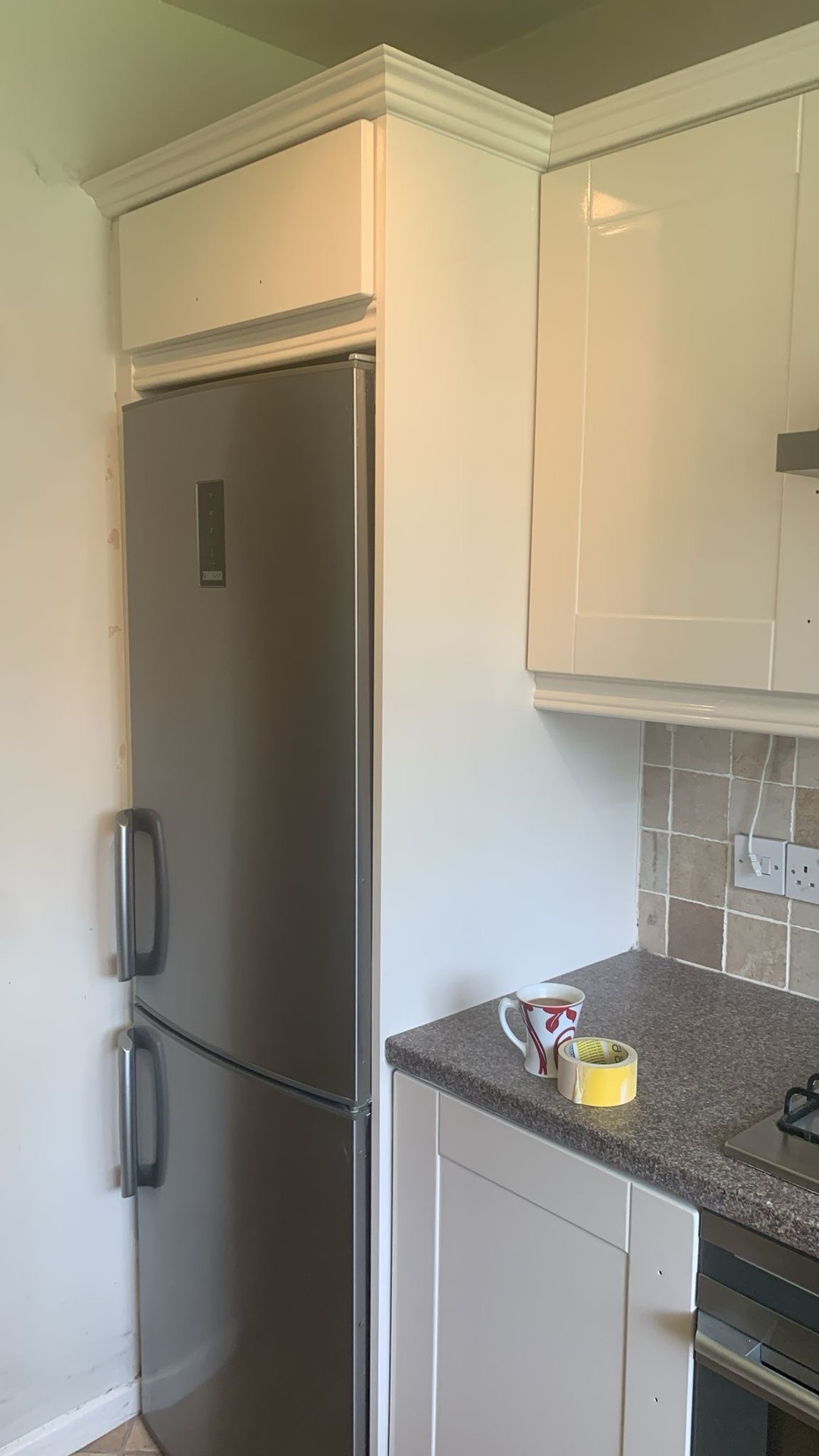 Added a nice airy and fresh feeling to this kitchen this week by stripping off the old worn vinyl, priming the MDF surfa